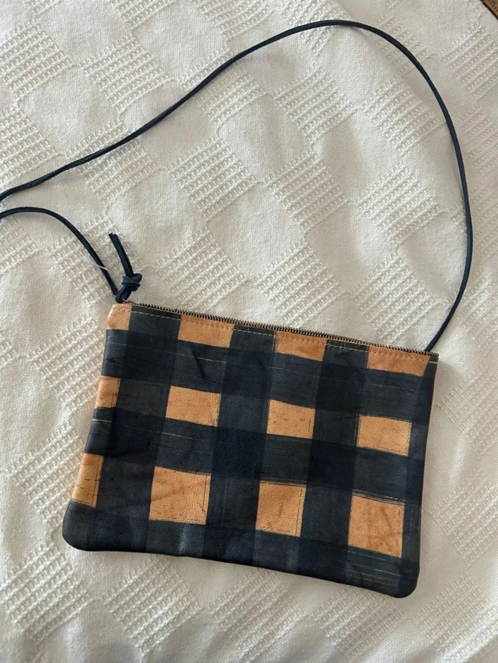 Pine &āBoon leather crossbody bag soft, hand-painted leather zipper closure.